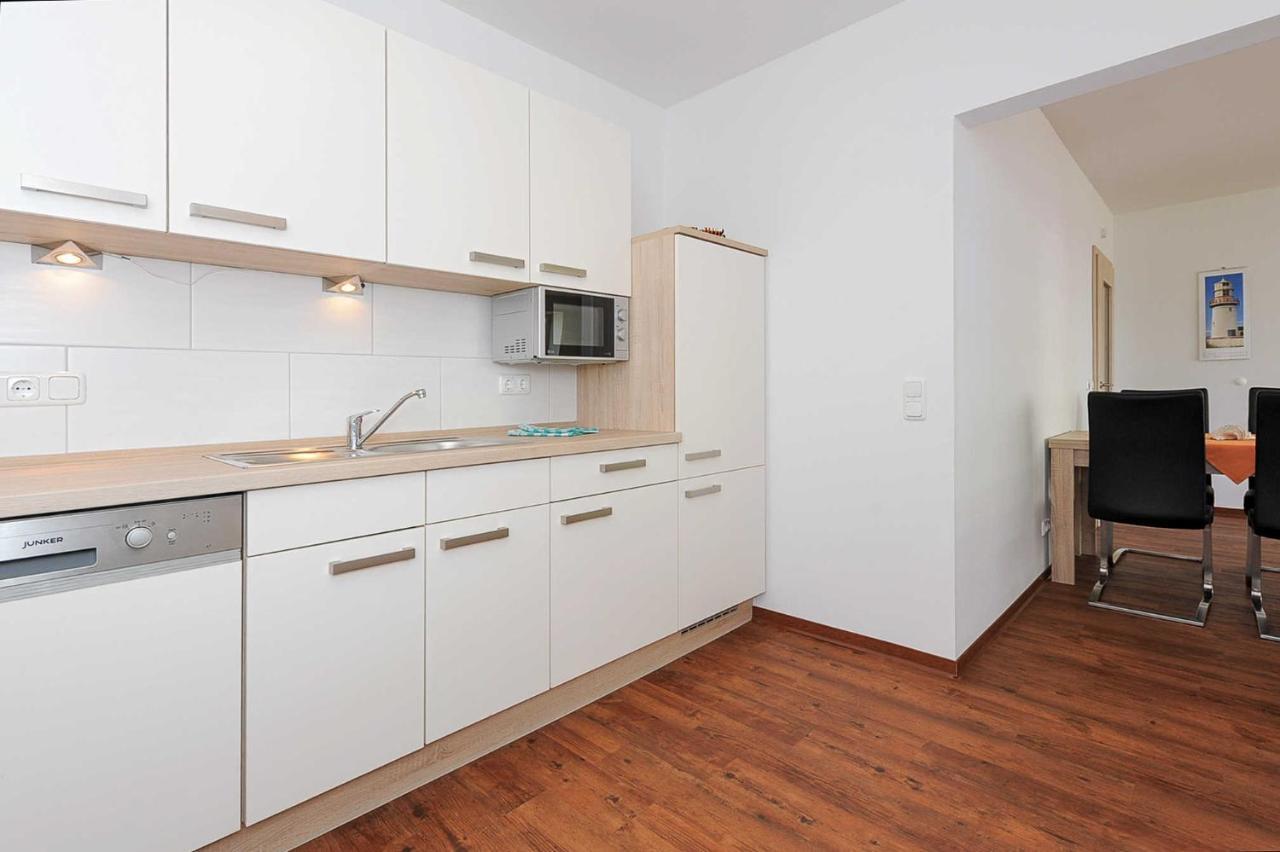 Apartamento Haus Leuchtturm Bensersiel Exterior foto