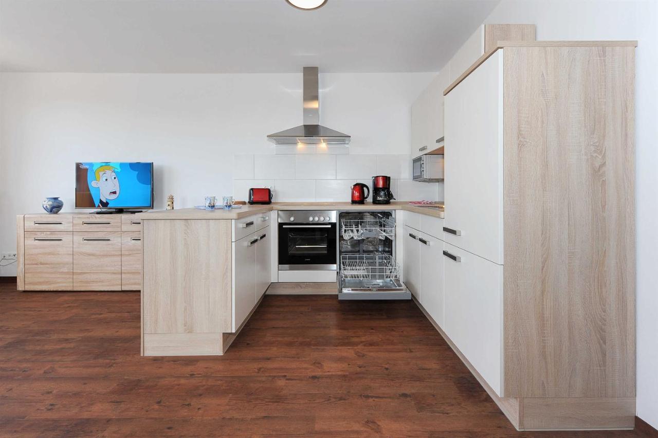 Apartamento Haus Leuchtturm Bensersiel Exterior foto